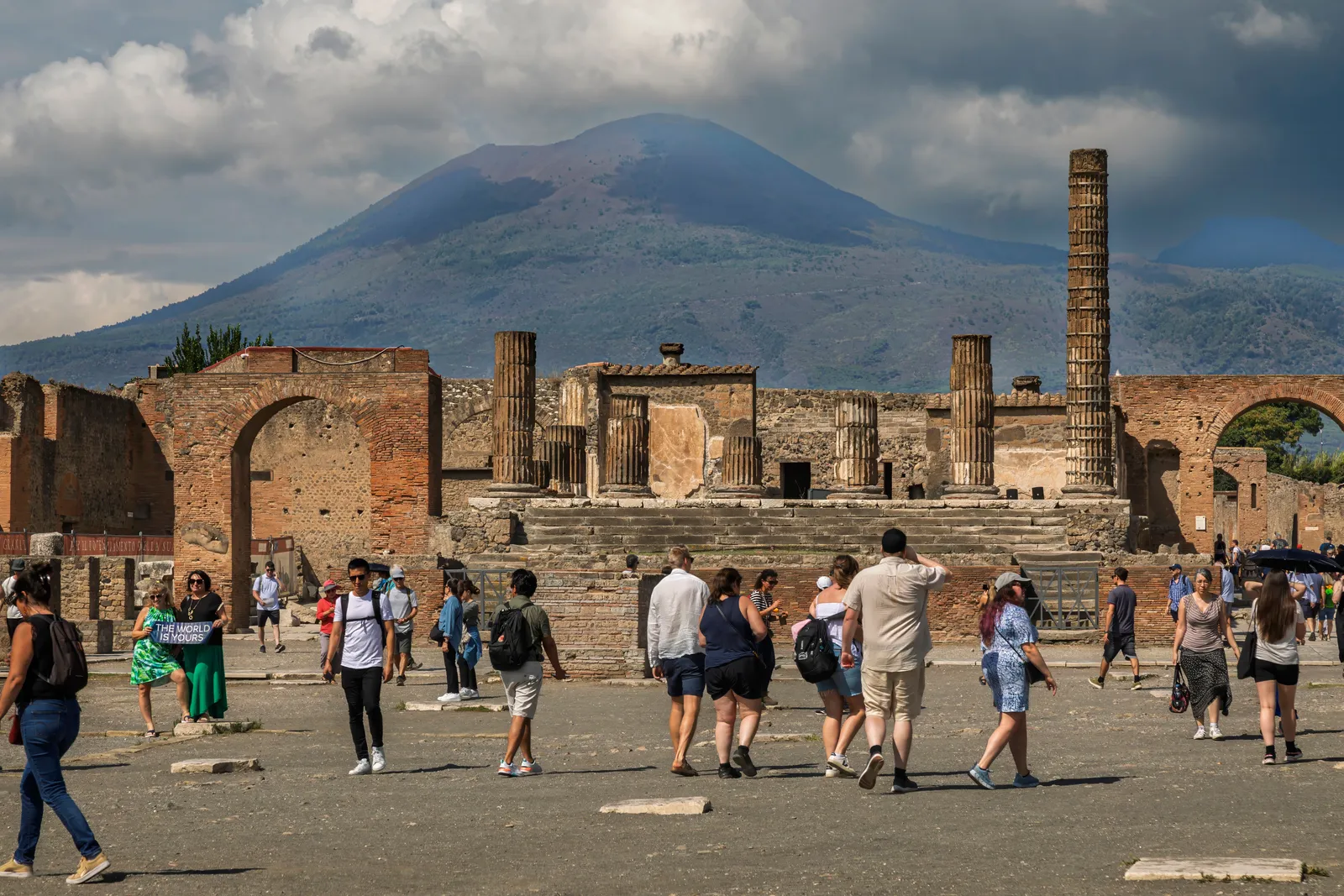 The forum of Pompeii with Mount Vesuvius rising behind the ruins