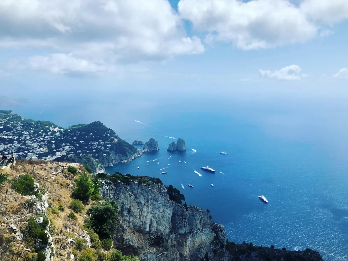 The cliffs and blue water off the coast of Capri seen from above, Italy