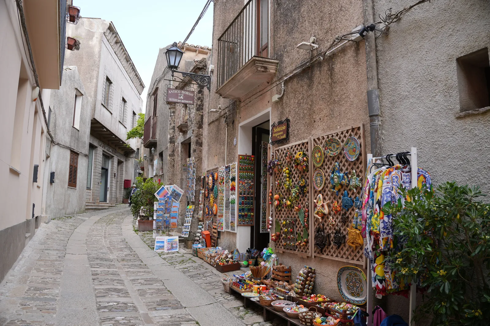 A narrow lemon scented alley lined with shops in the centre of Capri town, Italy