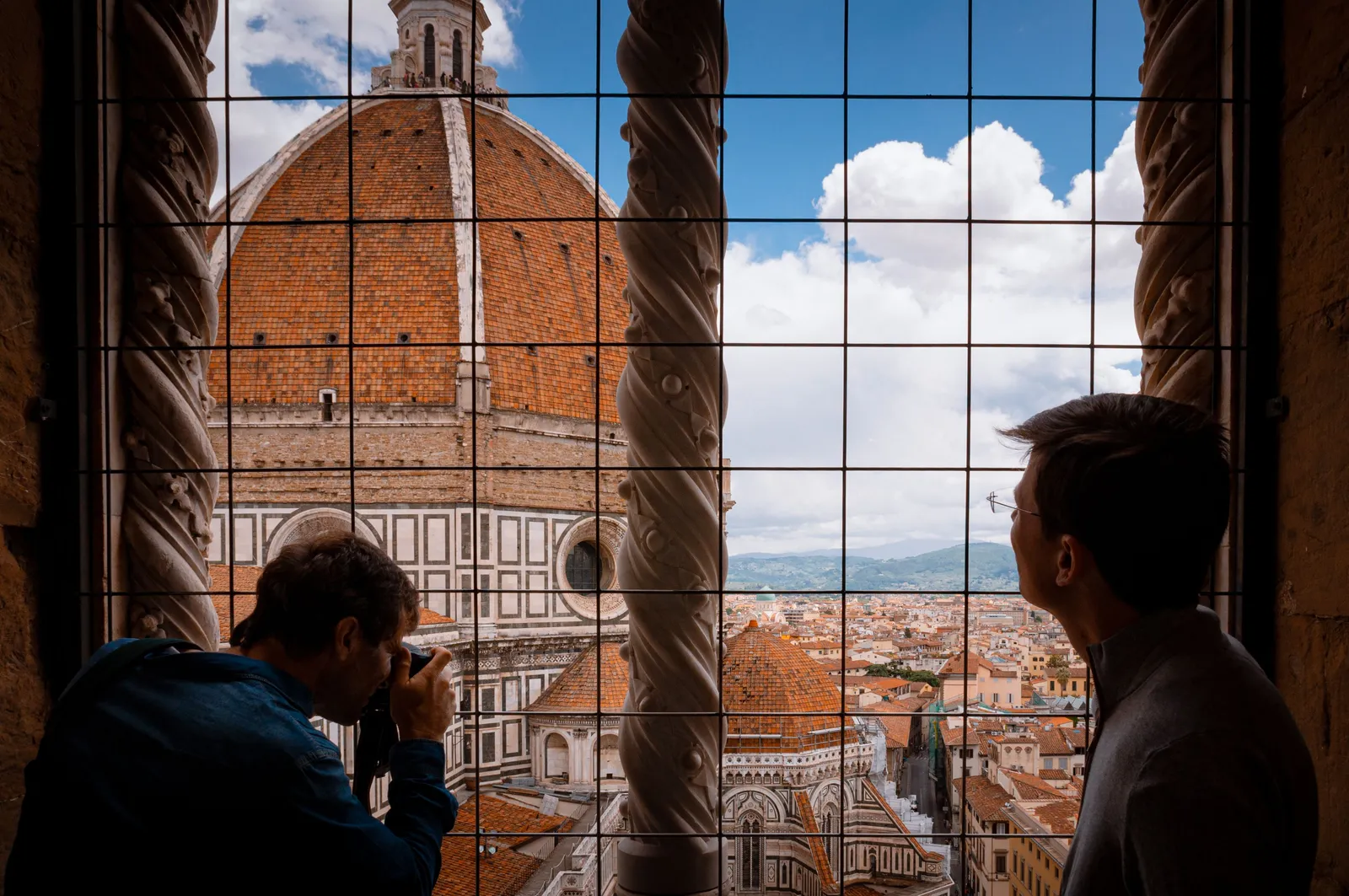 Renaissance sculptures and grand stone architecture in a historic square in Florence