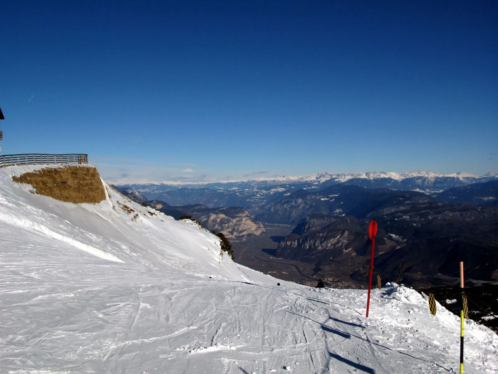Snow-covered peaks of the Dolomites in northern Italy under a clear winter sky