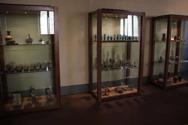 Glass display cases of ancient finds in an exhibition hall