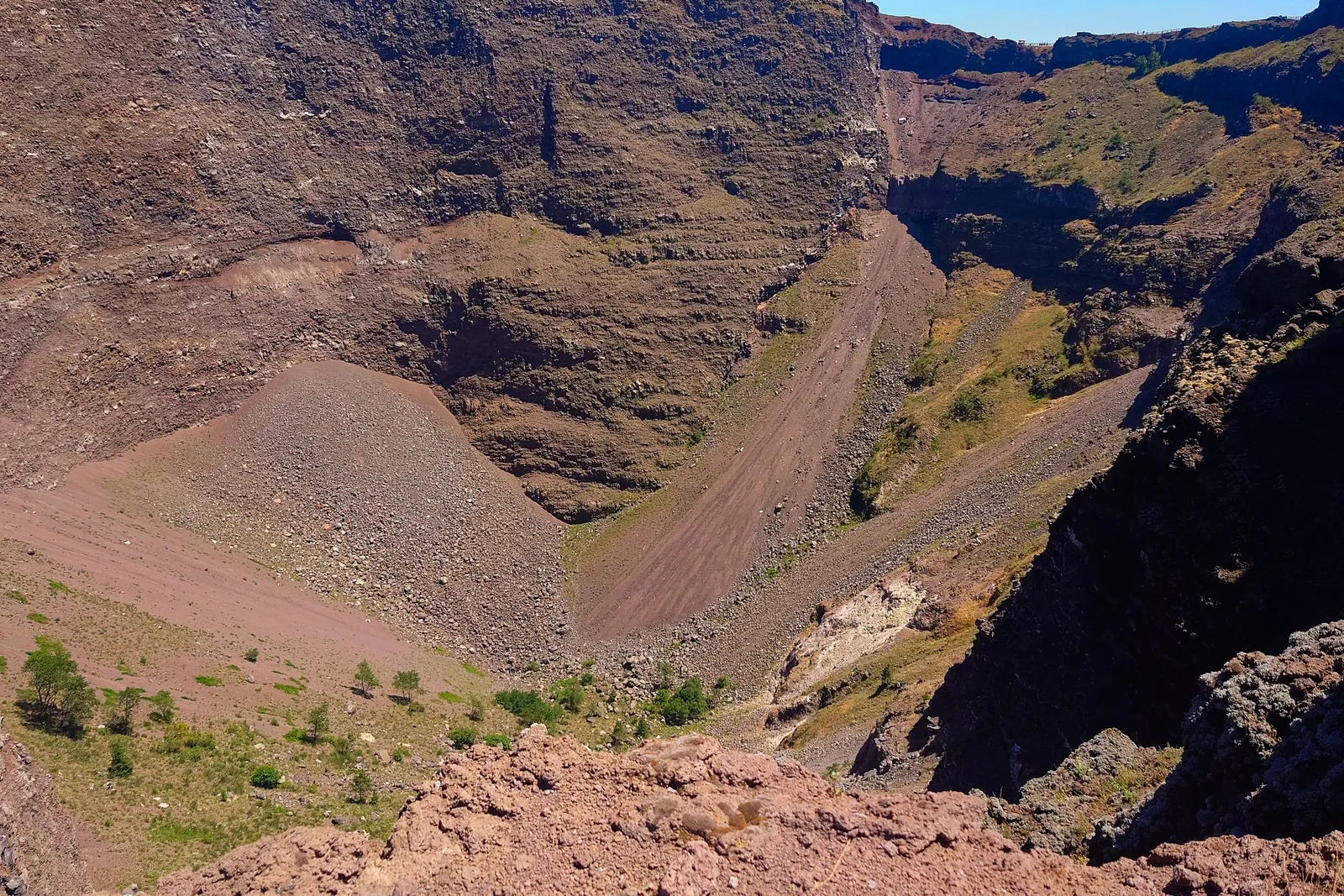The wide crater rim of Mount Vesuvius above the Bay of Naples, Italy