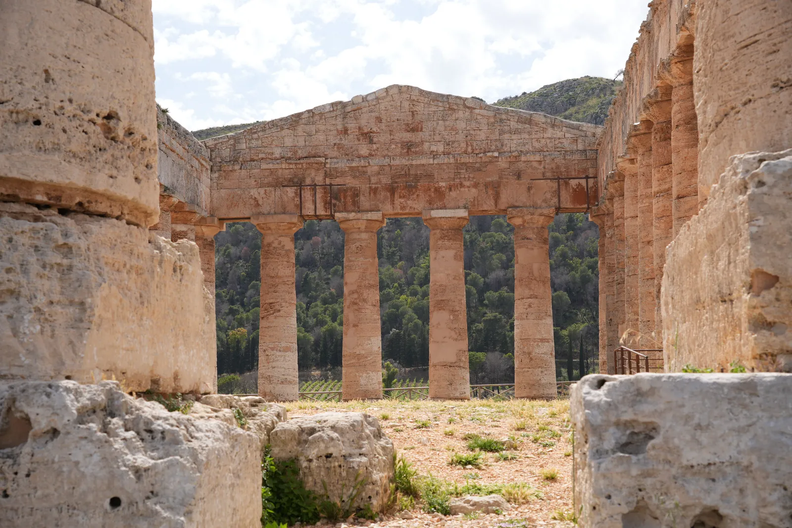Ancient Greek temple ruins standing among the hills of western Sicily, Italy