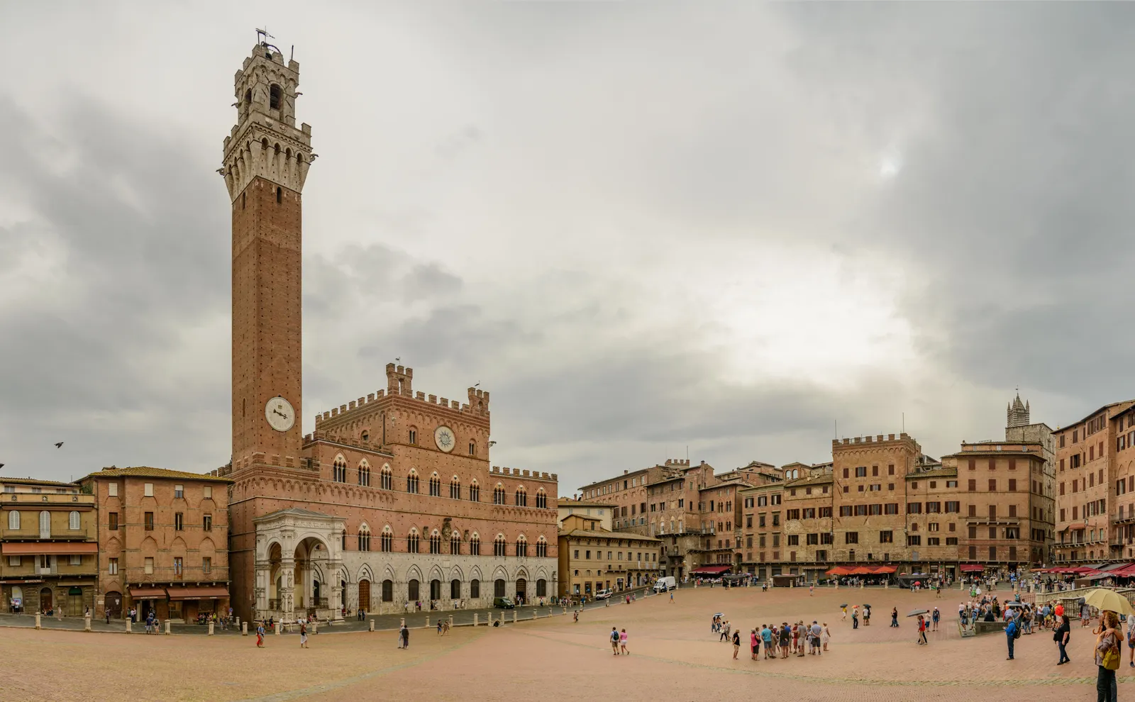 The shell-shaped Piazza del Campo and its tower in Siena, Italy