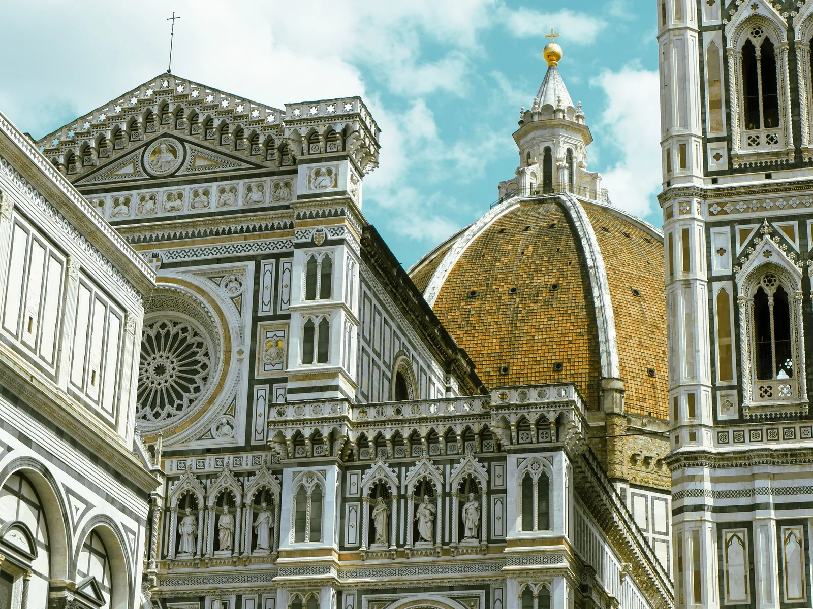 The dome and bell tower of Florence cathedral rising above the city, Italy