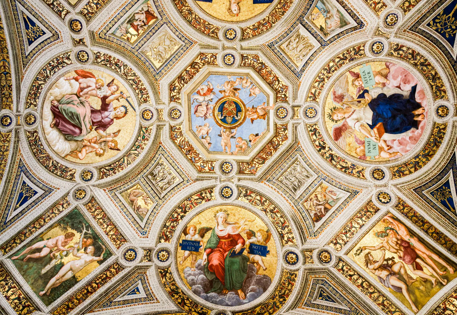The painted ceiling of the Sistine Chapel in the Vatican, Rome, Italy