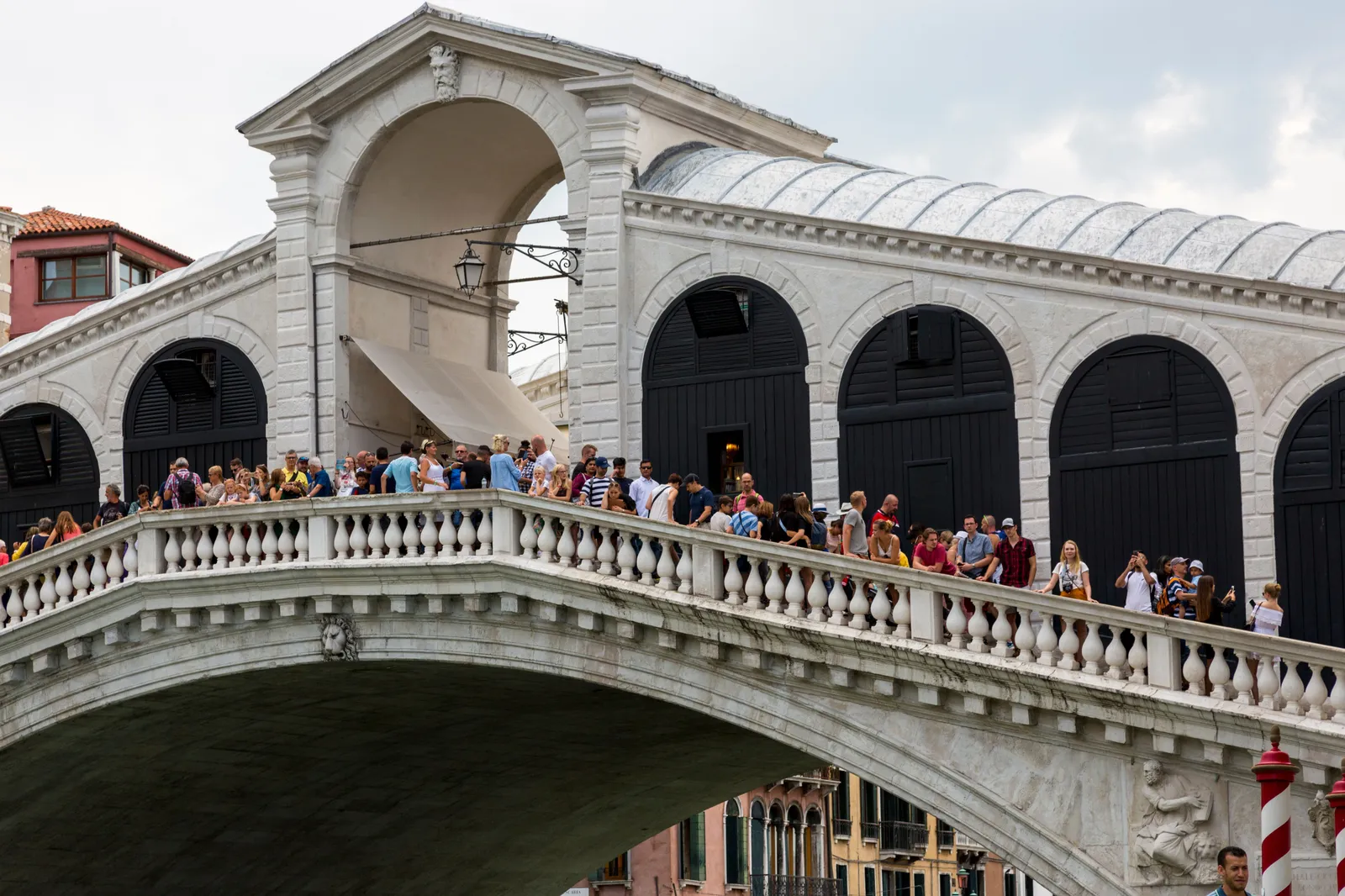 A gondola on the Grand Canal with the domed church of the Salute behind in Venice, Italy
